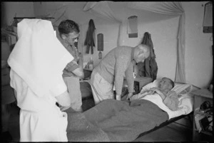 Prime Minister Peter Fraser talking to E F Hocking at 2 New Zealand General Hospital, Caserta, Italy, World War II - Photograph taken by George Kaye
