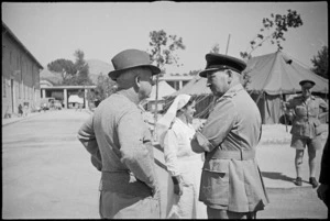Prime Minister Peter Fraser talks to General W C Hartgill at 2 New Zealand General Hospital, Caserta, Italy, World War II - Photograph taken by George Kaye