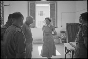 Prime Minister Peter Fraser talks to Sister E A Worsp at 2 NZ General Hospital, Caserta, Italy, World War II - Photograph taken by George Kaye