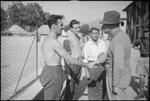 Prime Minister Peter Fraser talking to three 'Tommies' at 2 NZ General Hospital, Caserta, Italy, World War II - Photograph taken by George Kaye