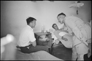 General Bernard Freyberg speaks to a patient at 2 NZ General Hospital, Caserta, Italy, World War II - Photograph taken by George Kaye