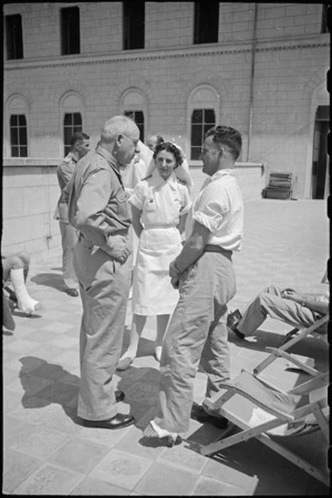 B L Rees talks to Prime Minister Peter Fraser on the roof of 1 NZ General Hospital, Molfetta, Italy, World War II - Photograph taken by George Bull