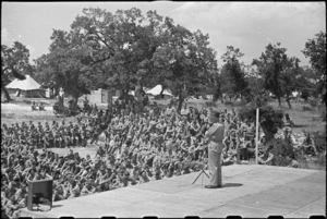 Prime Minister Peter Fraser addresses troops at NZ Advance Base in Italy, World War II - Photograph taken by George Bull