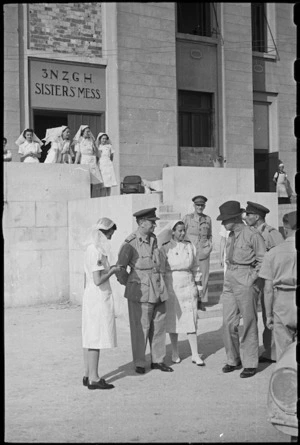 Prime Minister Peter Fraser with official party outside the Sisters' Mess at 3 NZ General Hospital, Bari, Italy, World War II - Photograph taken by George Bull