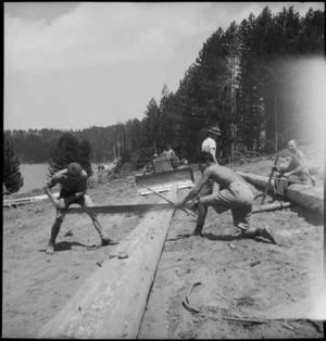 Sawing up a long log at the New Zealand Forestry Unit mill in southern Italy, World War II - Photograph taken by M D Elias