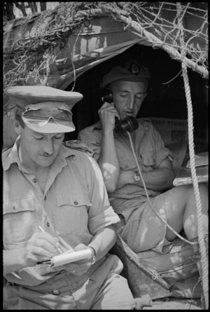 Captain A Simpson and S P Coles communicating from 29 Battery Command Post in the Sora area, Italy, World War II - Photograph taken by George Kaye