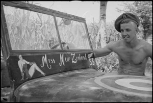 D I Johns with a decorated jeep near Sora, Italy, World War II - Photograph taken by George Kaye