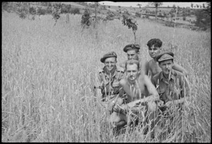 Group of New Zealanders in wheatfield near Sora, Italy, World War II - Photograph taken by George Kaye