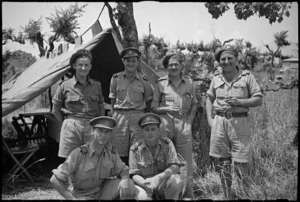 Group of war correspondents and officers prior to departure for NZ of B Hewitt, Italy, World War II - Photograph taken by George Kaye