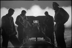 Close up view of New Zealand 25 Pounder firing at night near Sora, Italy, World War II - Photograph taken by George Kaye