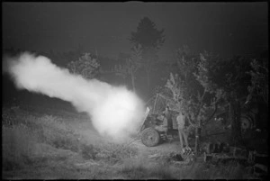 General view of New Zealand 25 Pounder firing at night near Sora, Italy, World War II - Photograph taken by George Kaye