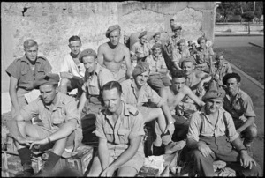 Members of 26 NZ Battalion and 27 NZ (Machine Gun) Battalion resting on Bren carriers in Sora, Italy, after its capture - Photograph taken by George Kaye