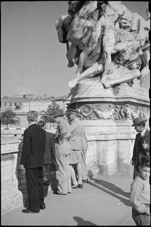 Prime Minister Peter Fraser and General Bernard Freyberg stop on one of bridges over the Tiber, Rome, World War II - Photograph taken by George Bull