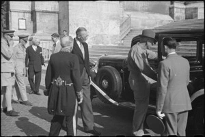 Prime Minister Peter Fraser enters Vatican car to attend audience with the Pope, Italy, World War II - Photograph taken by George Bull