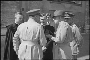 Father Snedden and Father Flanagan chat with Generals Puttick and Freyberg, and Prime Minister Peter Fraser in Rome, Italy, World War II - Photograph taken by George Bull