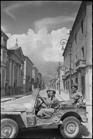 View down one of principal streets of Sora, Italy, with New Zealand jeep in foreground, World War II - Photograph taken by George Kaye