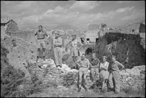 Members of 22 NZ Battalion among ruins of castle overlooking Vicalvi, Italy, World War II - Photograph taken by George Kaye