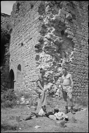 F K May and R W Poppe camp among the ruins of the castle of Vicalvi, Italy, World War II - Photograph taken by George Kaye