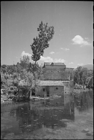 House on the Fibrino River used as NZ Divisional water point, Italy, World War II - Photograph taken by George Kaye