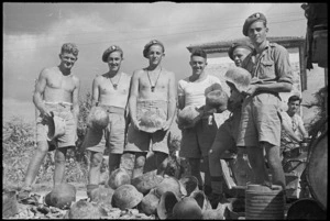New Zealanders with German tin helmets near Sora, Italy, World War II - Photograph taken by George Kaye