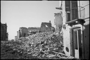 Rubble filled street in Orsogna, Italy, World War II - Photograph taken by George Kaye