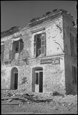 Name plates on building in Orsogna, Italy, remain in position despite heavy attack during World War II - Photograph taken by George Kaye