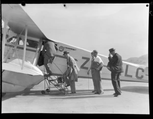 Passengers embarking on aircraft Tiora, New Zealand National Air Corporation, Rongotai, Wellington