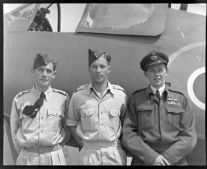 RNZAF group at Ohakea, Whanganui District, showing (L to R), Flight Officers R A Mackinder, N E Hanna and W A L Trott, DFC
