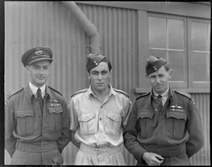 RNZAF group at Ohakea, Whanganui District, showing (L to R), Flight Lieutenant H D Coppersmith, Flight Sargeant J D Waugh and Flying Officer C G Berryman