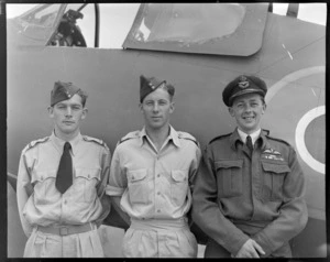 RNZAF group at Ohakea, Whanganui District, showing (L to R), Flight Officers R A Mackinder, N E Hanna and W A L Trott, DFC