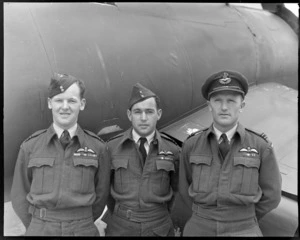 RNZAF group at Ohakea, Whanganui District, showing (L to R), Flight Lieutenants G R B [Highet?], G W Annand and J R Claydon