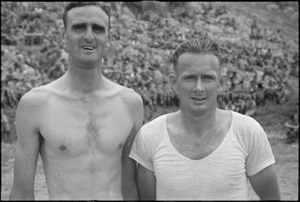 Lieutenant R E Johnson and J R Barron, first and second place-getters in 880 yards at 4 NZ Armoured Brigade Sports in Isola del Liri, Italy, World War II - Photograph taken by George Kaye