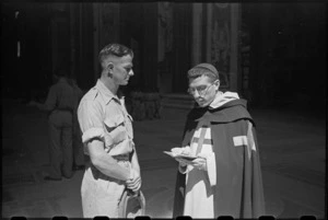 G J Callander chats with a priest at the entrance to St Peter's Basilica, Rome, Italy - Photograph taken by George Kaye