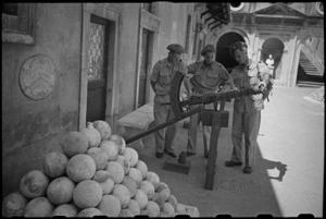 Ancient weapons examined at the Castel St Angelo by World War II New Zealand soldiers on leave in Rome, Italy - Photograph taken by George Kaye