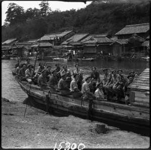 New Zealand soldiers on board a motor barge in Japan