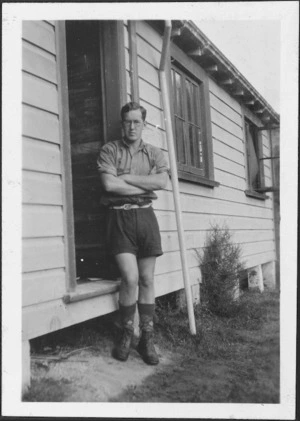 Ian Milner outside a crib at Waianakarua, Otago, New Zealand