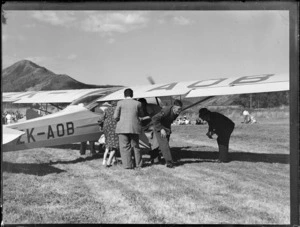 Auster Aircraft ZK-A0B at Mangere, individuals unidentified