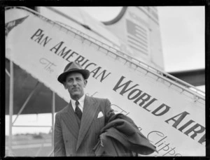 Portrait of an unidentified men, a passenger on a Pan American World Airways aeroplane