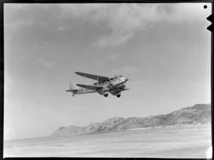 New Zealand National Airways Corporation de Havilland Dragon Rapide, ZK-AKY 'Tui', taking off from Rongotai Airport, Wellington