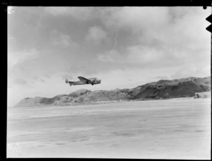 New Zealand National Airways Corporation Lockheed Lodestar aeroplane in flight over Rongotai Airport, Wellington