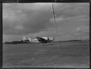 New Zealand National Airways Corporation (NZNAC) Lockheed Lodestar aircraft, 'Kawatere' (ZK-ANA) taking off from Mangere Aerodrome, Auckland