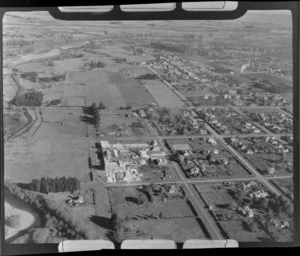 View south over the rural town of Temuka with the Temuka-Orari Highway and the [Temuka Pottery factory?] in foreground, South Canterbury Region