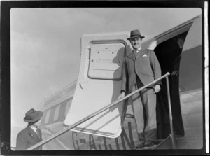 Portrait of Mr Cory-Wright disembarking from visiting British Vickers Viking passenger plane G-AJJN, location unknown