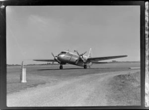 View of visiting British Vickers Viking passenger plane G-AJJN taxiing on runway at Paraparaumu Airfield, Wellington Region
