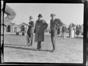View of (L to R) Mr Dickson, Prime Minister Peter Fraser and Colonel C W Salmon after demonstration flight on visiting British Vickers Viking passenger plane G-AJJN, location unknown