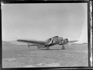 View of Union Airways NZ NAC, (National Airways Corporation) Lockheed Electra 'Kaka' ZK-AGK taxiing on the runway at an unknown airfield