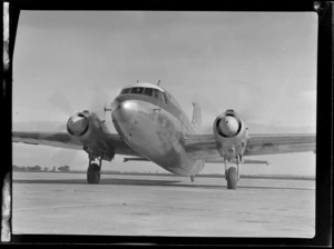 Visiting British Vickers Viking passenger plane G-AJJN on the runway of an unknown airfield