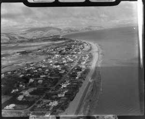 View south down the western coastline with the settlements of Paraparaumu in foreground with Raumati and Paekakariki beyond, Kapiti Coast, Wellington Region