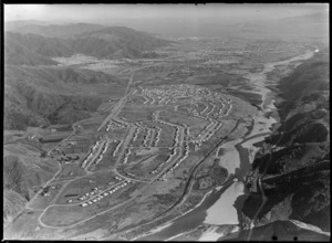 View south over the Lower Hutt Valley with the new suburb of Taita under construction in the foreground and Wellington Harbour beyond