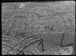 One Tree Hill Borough Council area and Cornwall Park with [Military Hospital?] in foreground and Campbell Road, looking to the suburb of Ellerslie, Auckland City